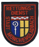 Abzeichen Berufsfeuerwehr Mönchengladbach in rot / Rettungsdienst